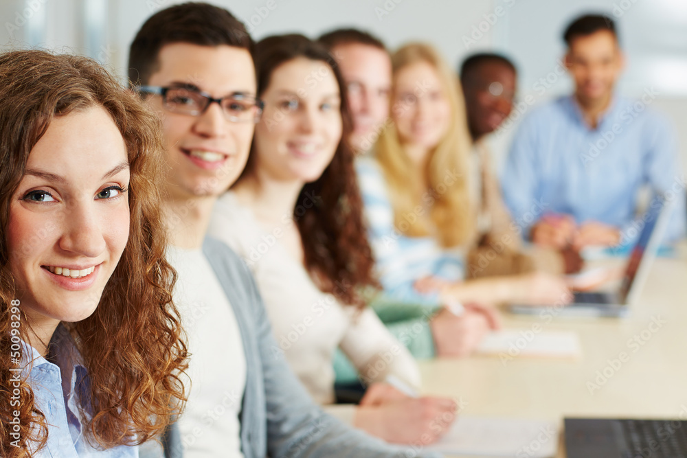 Studentin im Seminar mit anderen Studenten Stock Photo | Adobe Stock
