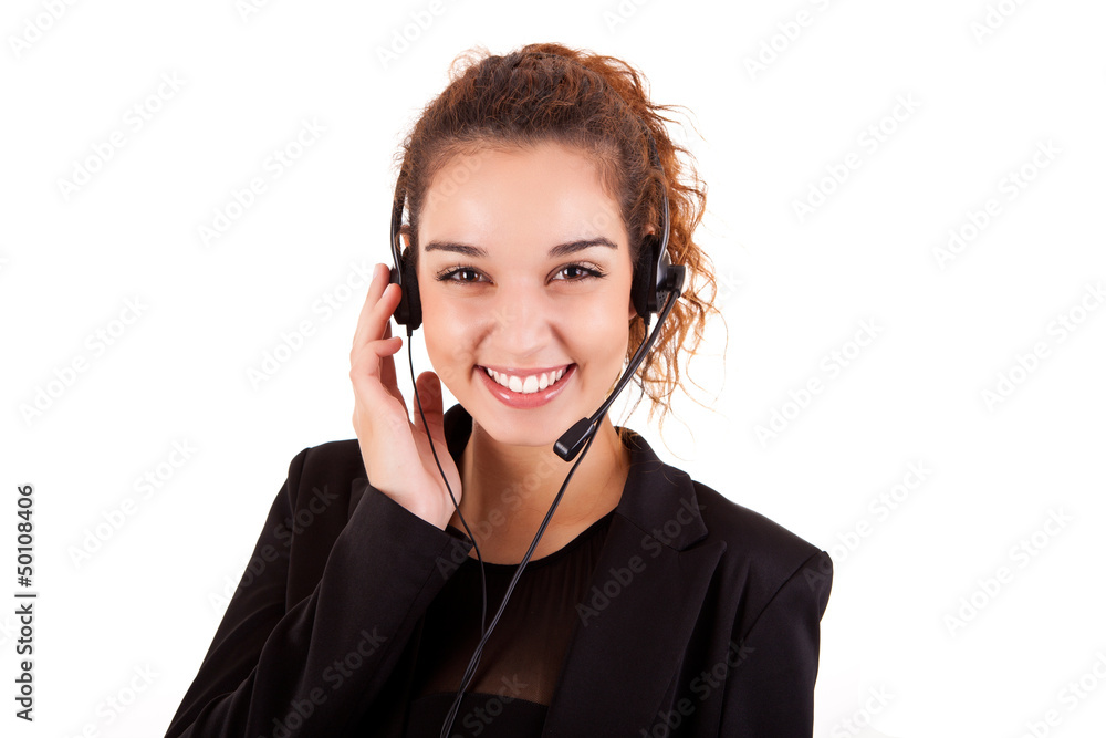 Portrait of a happy young call center employee smiling with a he Portrait of a happy young call center employee smiling with a he
