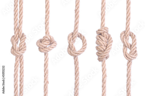 A set of knots of rope connected isolated on a white
