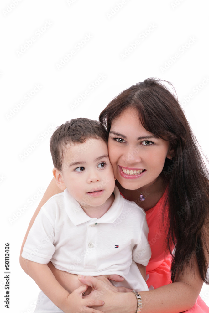 Happy young mother and her son posing together. Isolated over wh Happy young mother and her son posing together. Isolated over wh