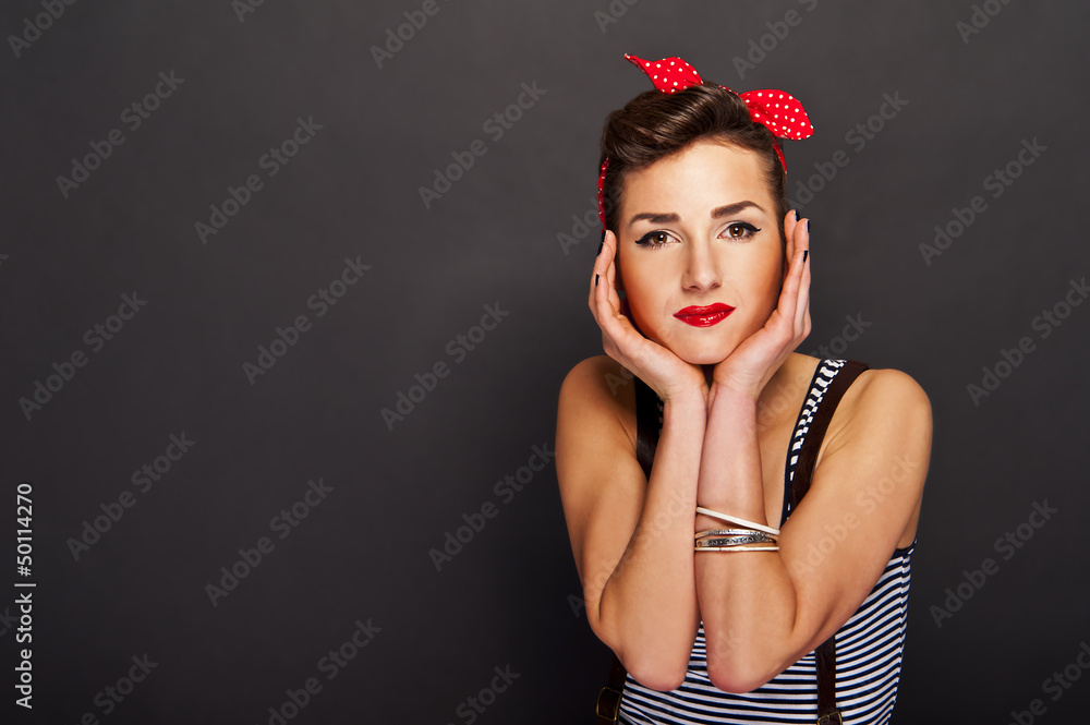 Naklejka premium Pin-up woman with big smile on black background