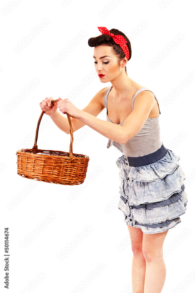 Woman in Pin-up style on white background with basket