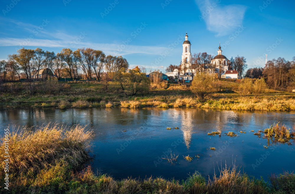 landscape with river and church