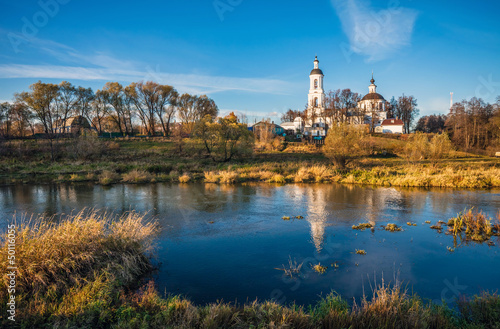 landscape with river and church