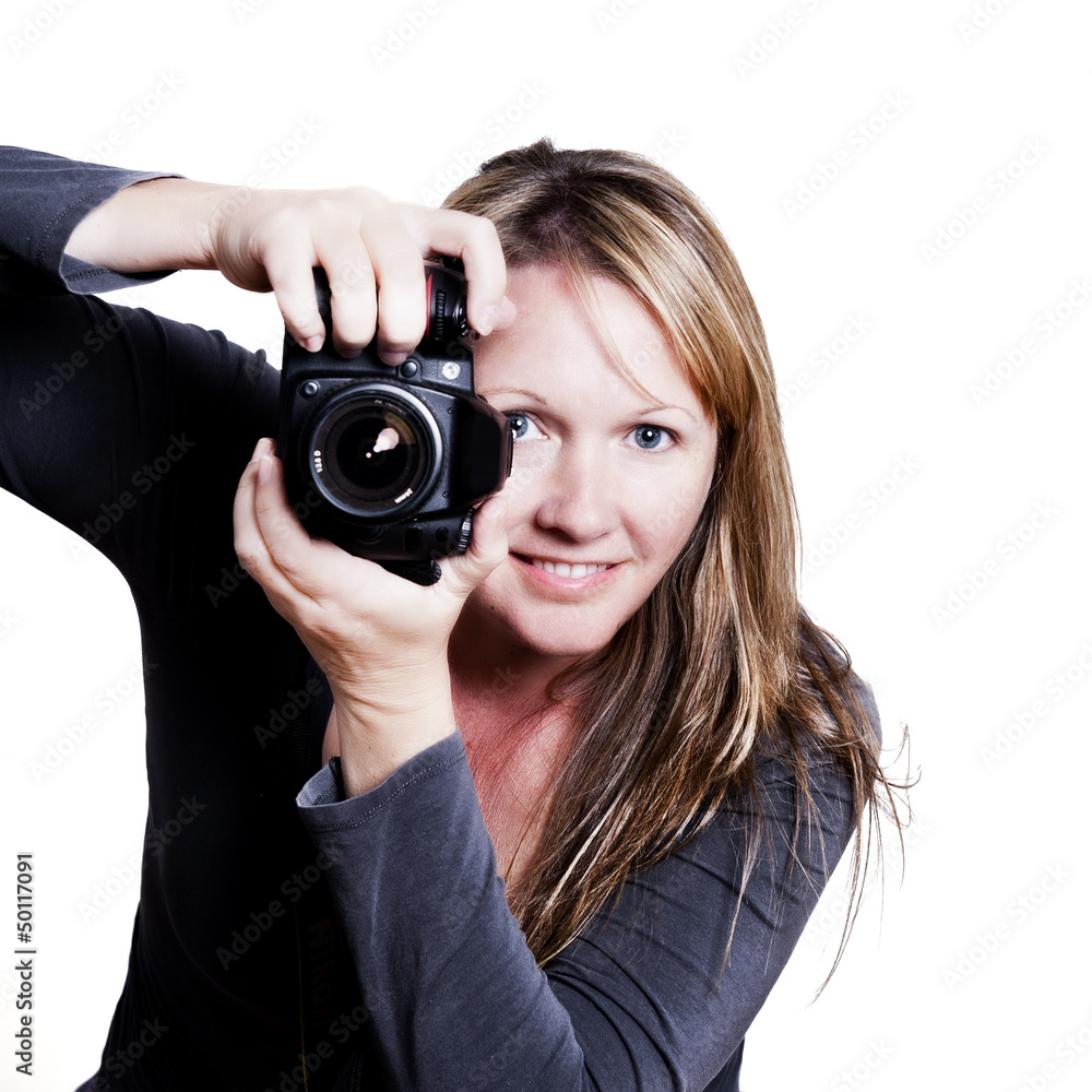 attractive 30something photographer aiming her camera attractive 30something photographer aiming her camera