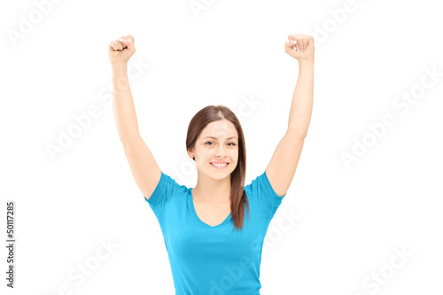Beautiful young female gesturing happiness