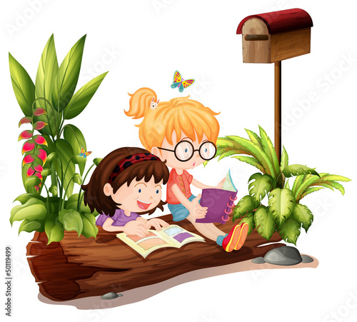 Two young girls near the wooden mailbox