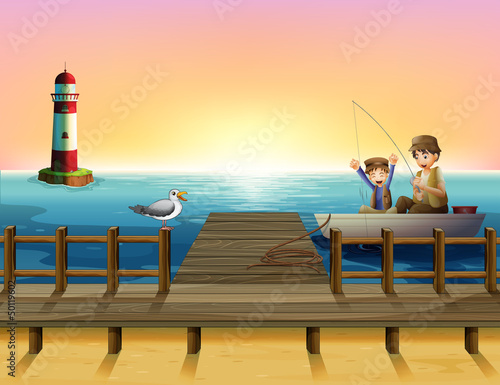 A sunset at the port with boys fishing
