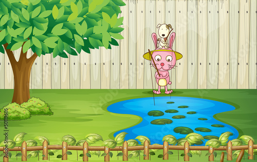 A bunny and a puppy fishing at the pond
