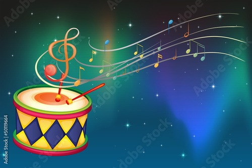 A drum and the musical notes and symbol