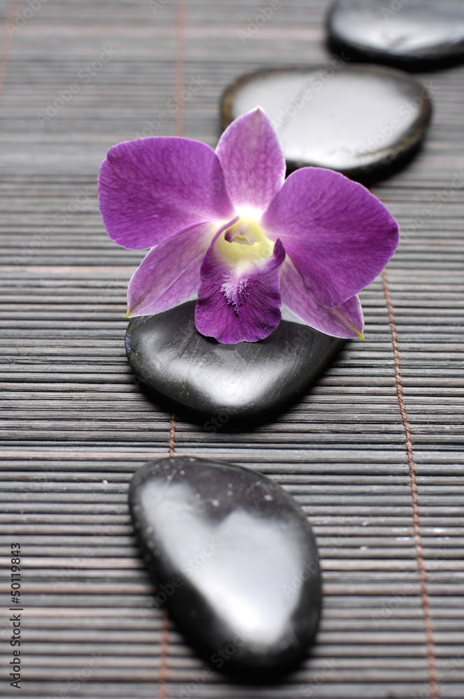 orchid and line Stones on bamboo stick straw mat orchid and line Stones on bamboo stick straw mat