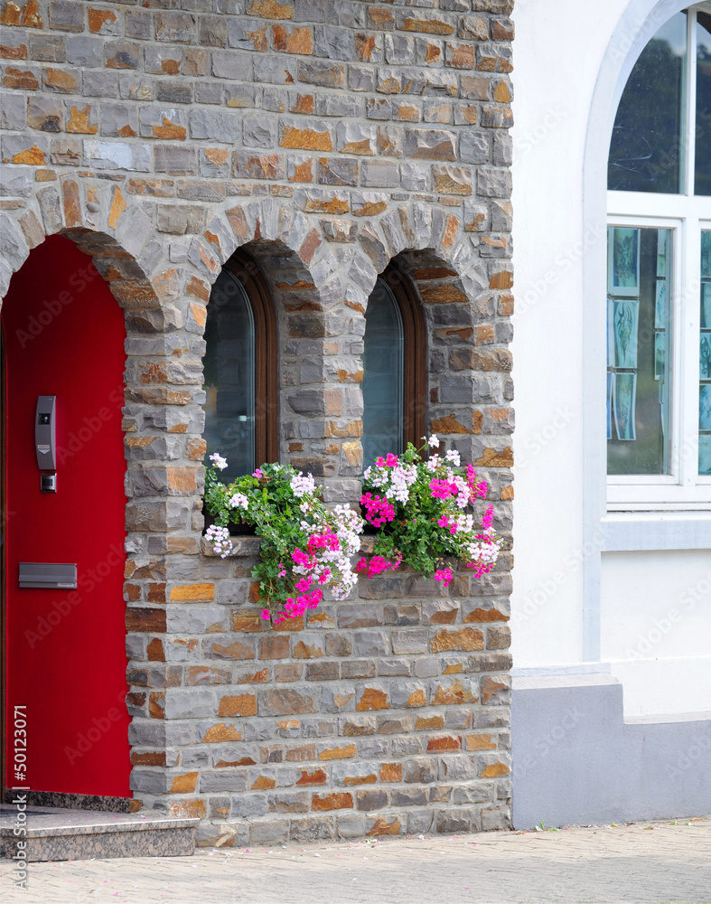 Old ornamented windows with flowers