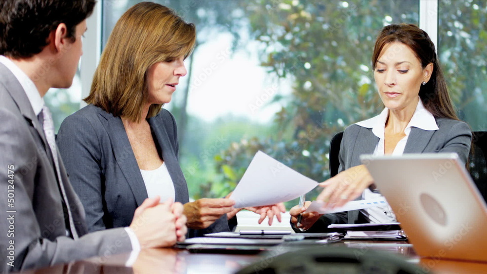 Businesswoman Leading Boardroom Meeting Businesswoman Leading Boardroom Meeting