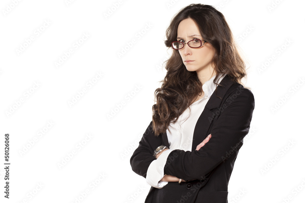 angry and sad pretty girl with hands crossed on white background angry and sad pretty girl with hands crossed on white background