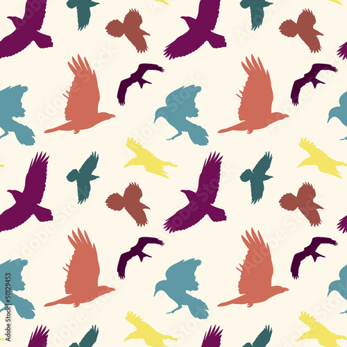 Colourful birds silhouettes seamless pattern