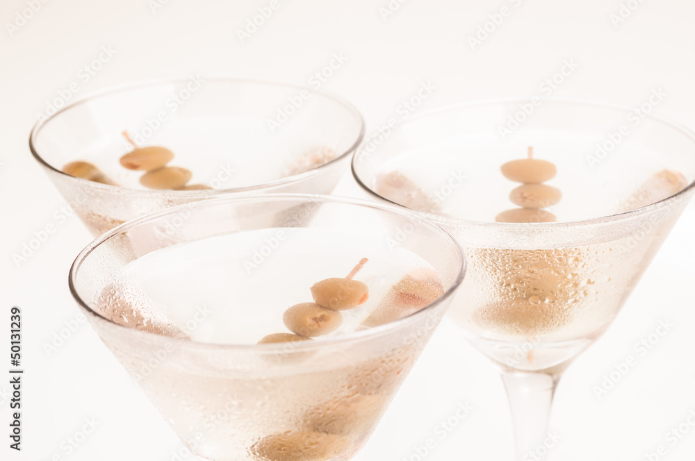 Three Dry Martini Cocktails top view close up Three Dry Martini Cocktails top view close up