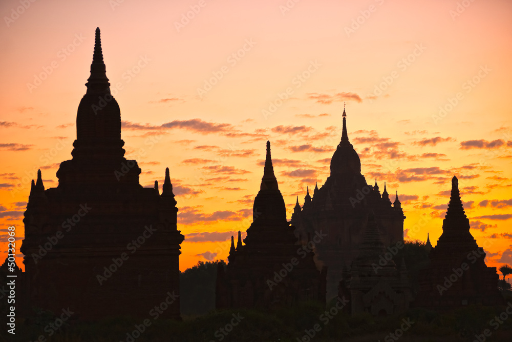 Silhouette of Buddhist Pagodas at sunrise, Bagan, Myanmar..