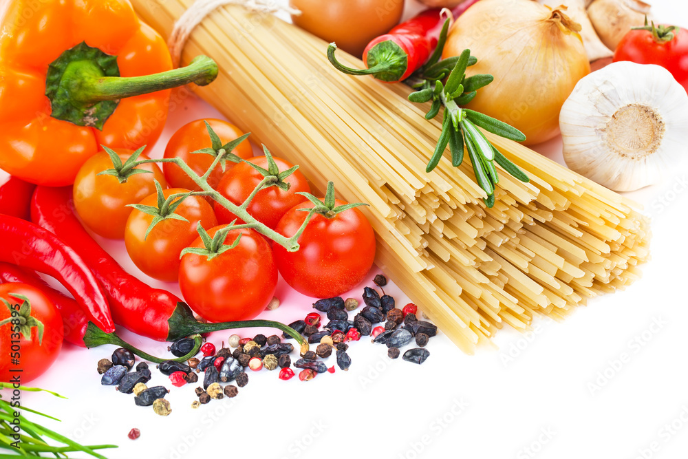 The composition of the pasta and vegetables on background The composition of the pasta and vegetables on background