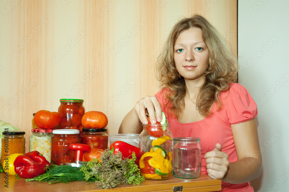 Woman making pickled vegetables