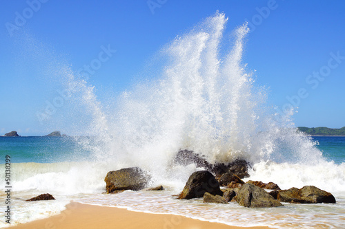 Big wave crashes on to the shore. Nacpan Beach. El Nido #50138299