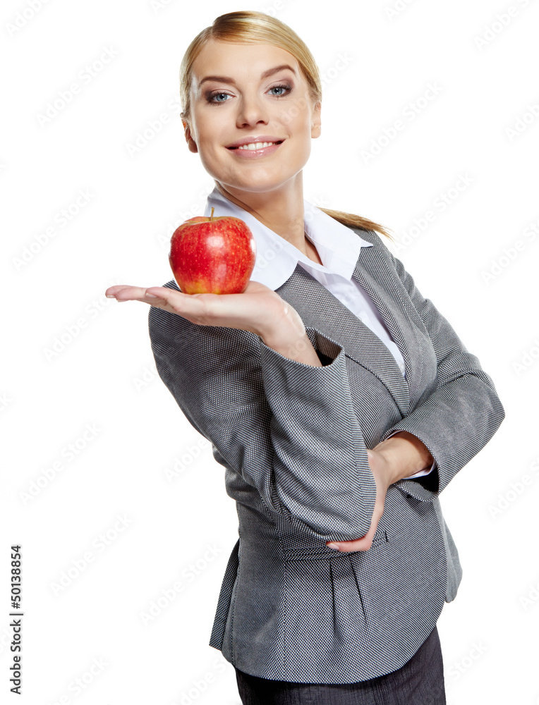 Businesswoman with red apple in her hand - healthy eating concep Businesswoman with red apple in her hand - healthy eating concep