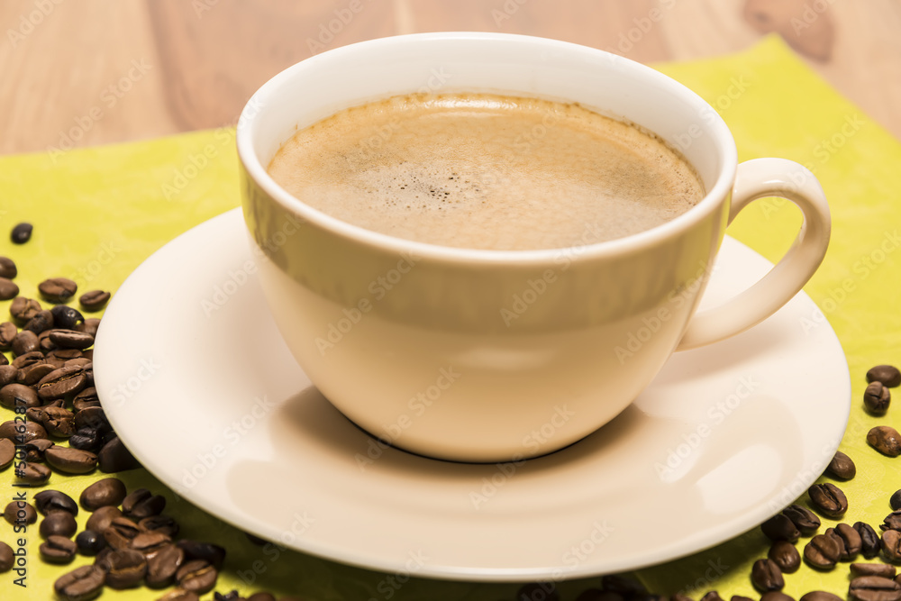 Cup of coffee with beans Cup of coffee with beans