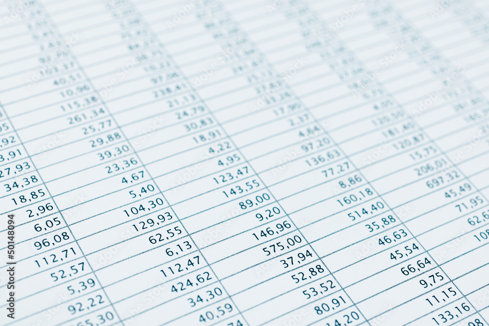 Business data financial report print close up. Blue toned. Business data financial report print close up. Blue toned.