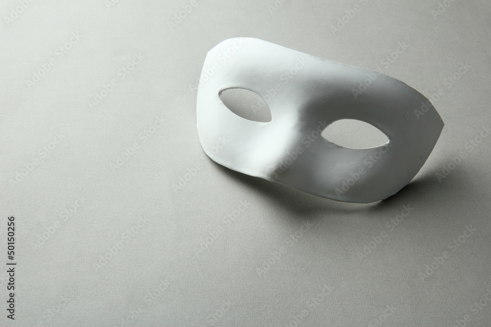 White mask, on grey background White mask, on grey background