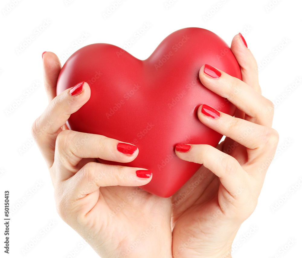 Obraz premium Red heart in woman hands, isolated on white