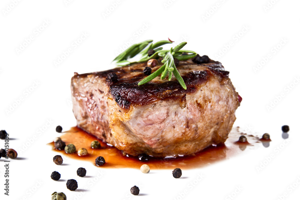 Beef steak medium grilled, isolated on white background