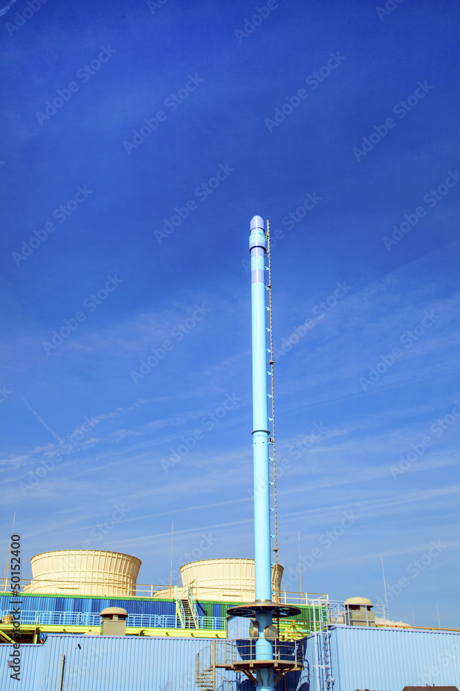 blue chimney in industry plant with smoke