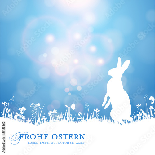 easter background with bunny against a sunny blue sky
