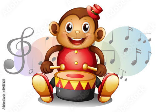 A monkey playing with the drum