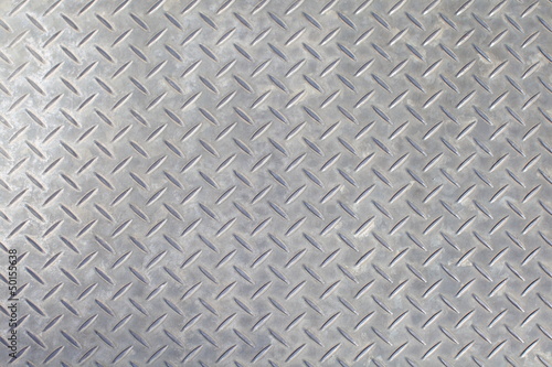 gray colored diamond plate background , White Background of old metal diamond plate in silver color background