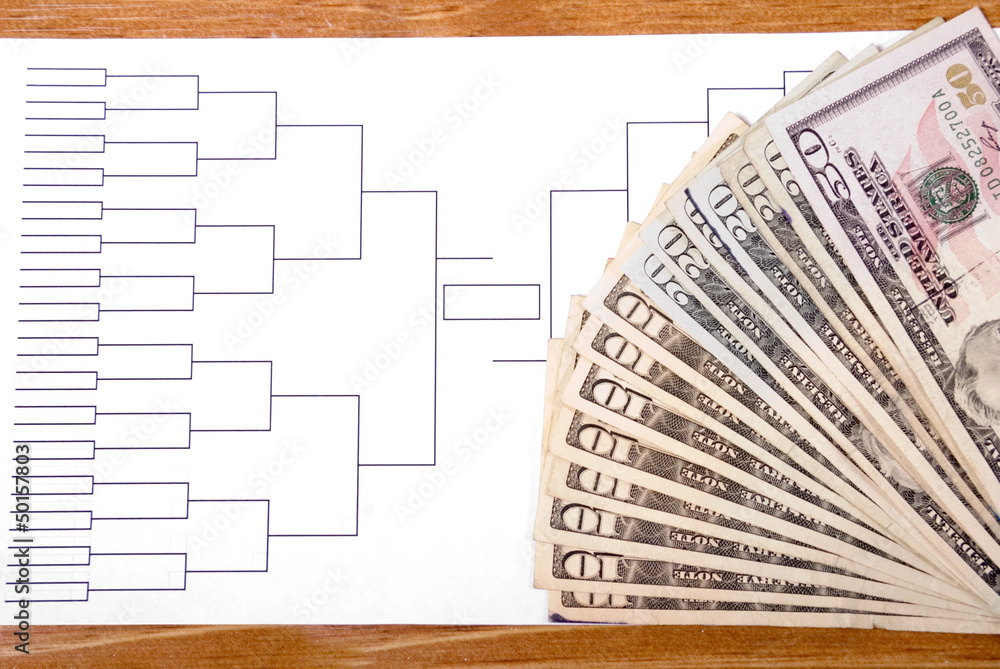 Obraz premium March Madness Bracket and Fanned Money on Right
