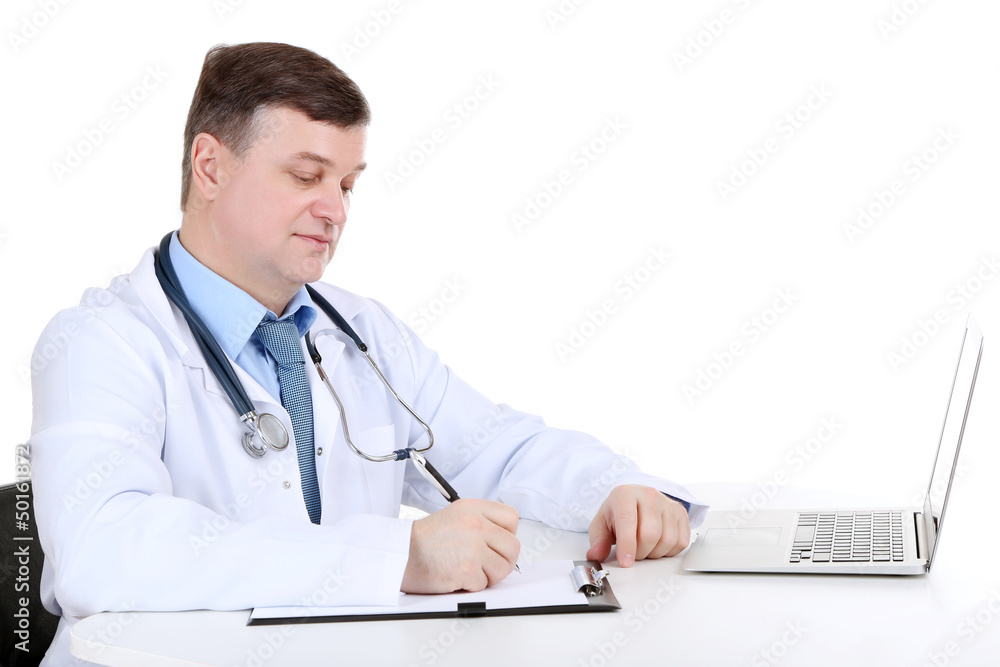 Medical doctor working at desk isolated on white Medical doctor working at desk isolated on white