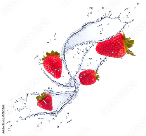 Strawberries in water splash, isolated on white background