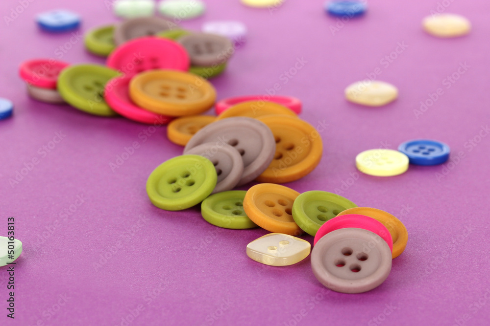 Bright color buttons on a purple background Bright color buttons on a purple background