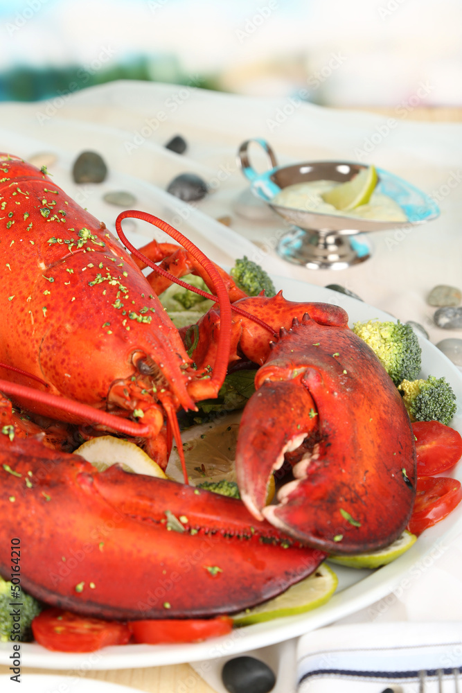 Red lobster on platter on serving table close-up Red lobster on platter on serving table close-up