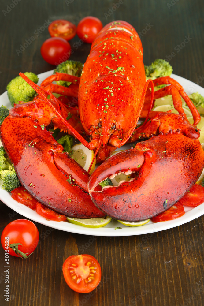 Red lobster on platter on table close-up Red lobster on platter on table close-up