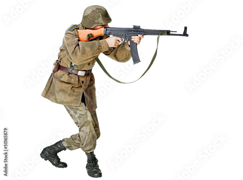 Soldier with submachine gun. Isolated on white background