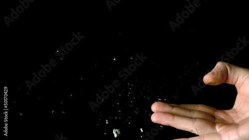 Man flicking away cigarette butt close up