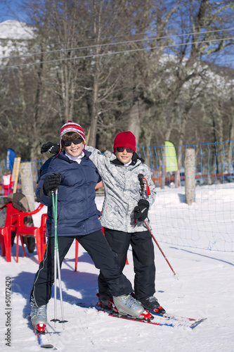 Hispanic boys skiing photo