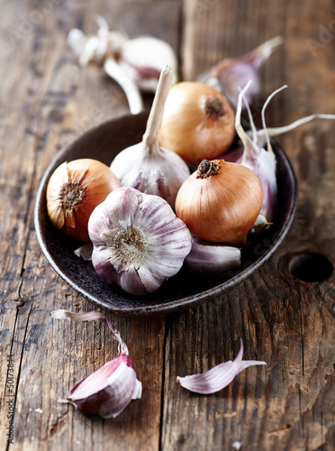 Garlic bulbs and onions