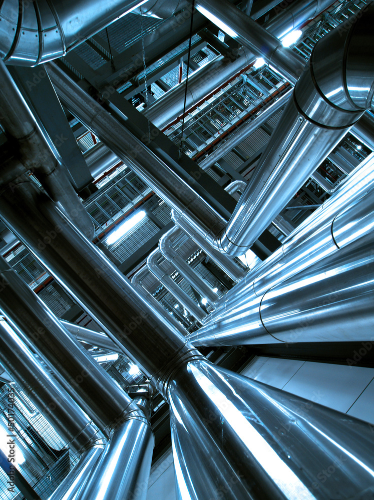 Obraz premium Industrial zone, Steel pipelines and cables in blue tones