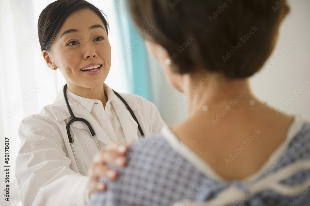 Japanese doctor talking to patient Japanese doctor talking to patient