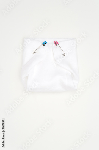 Old-fashioned pins in cloth diaper photo