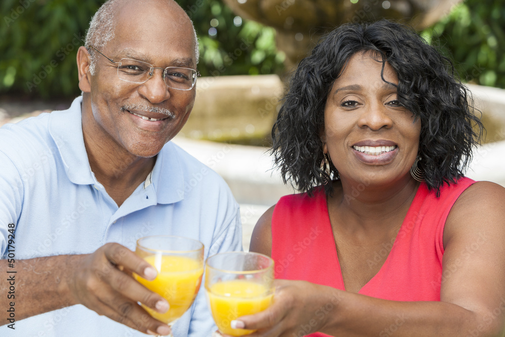 Senior African American Couple Drinking Orange Juice Senior African American Couple Drinking Orange Juice