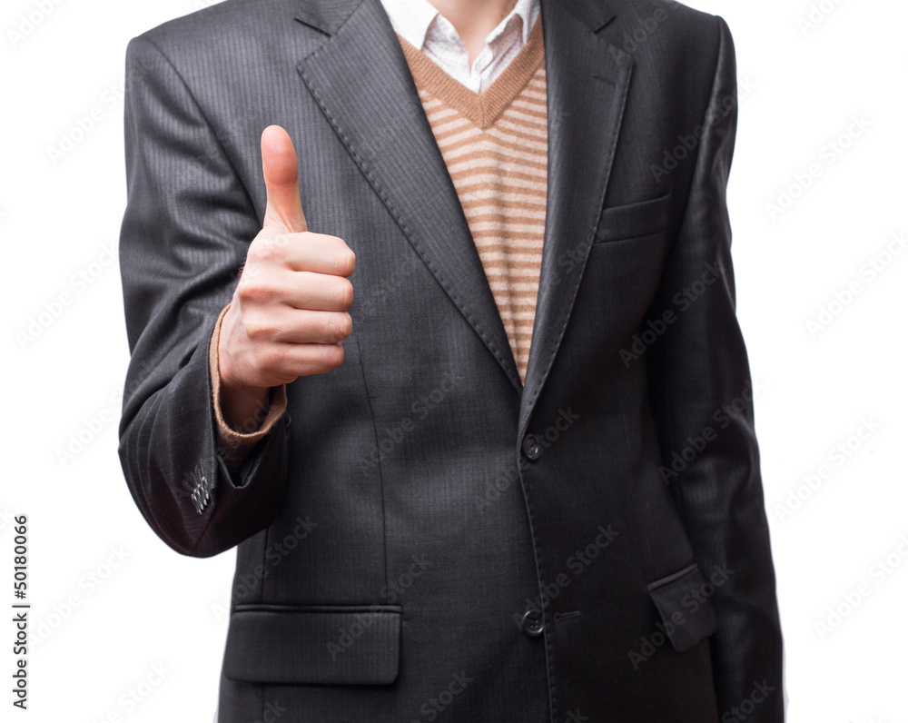 Smiling confident man holding his thumb up Smiling confident man holding his thumb up