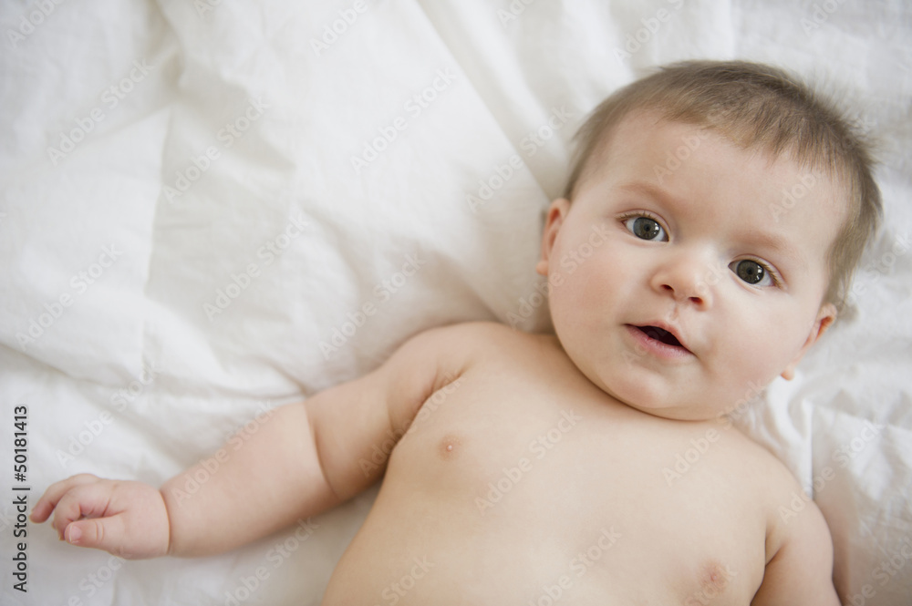 Caucasian baby boy laying on blanket Caucasian baby boy laying on blanket